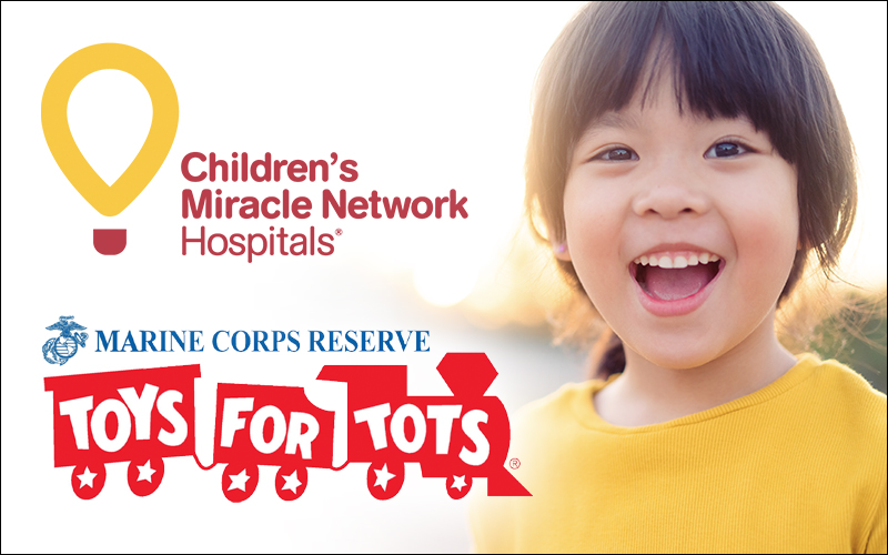 Girl smiling. Children's Miracle Network Hospitals logo and Marine Corps Reserve Toys for Tots logo