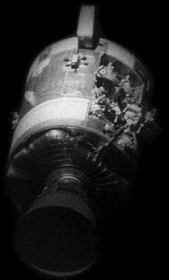 Apollo 13’s damaged service module, seen from the command module Odyssey, as it was being jettisoned shortly before re-entry.