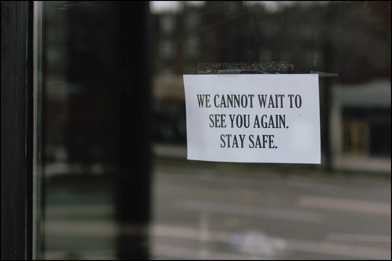 Sign on window that says: 