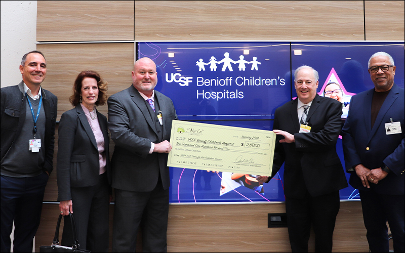 UCSF Benioff Children's Hospitals donation check presentation photo.