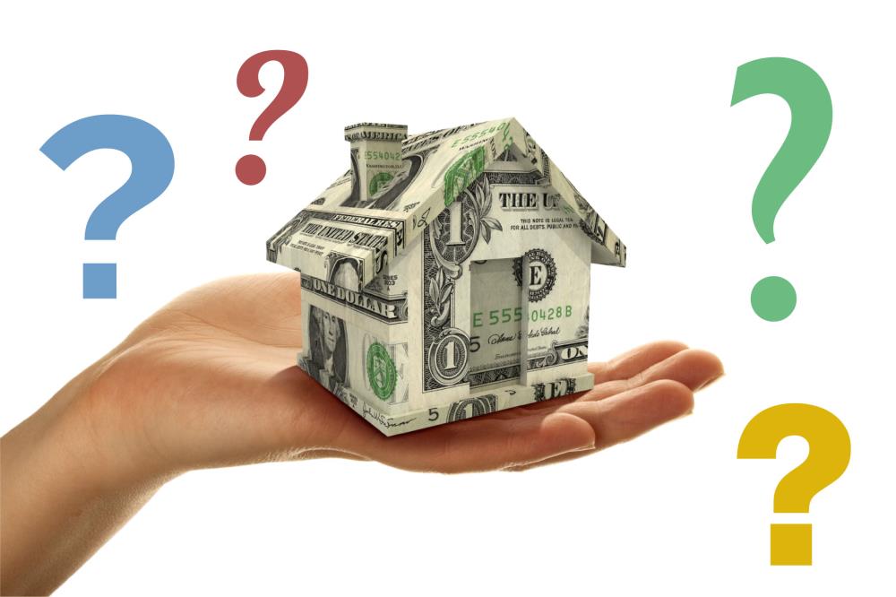 picture of a house with question marks around it