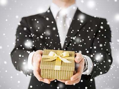 man holding a present