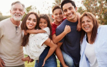 Family of four smiling