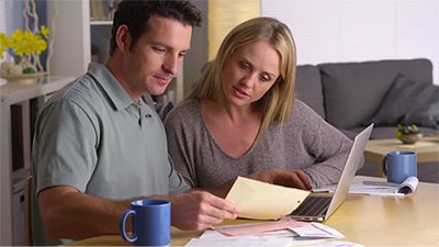 A couple looking over a document