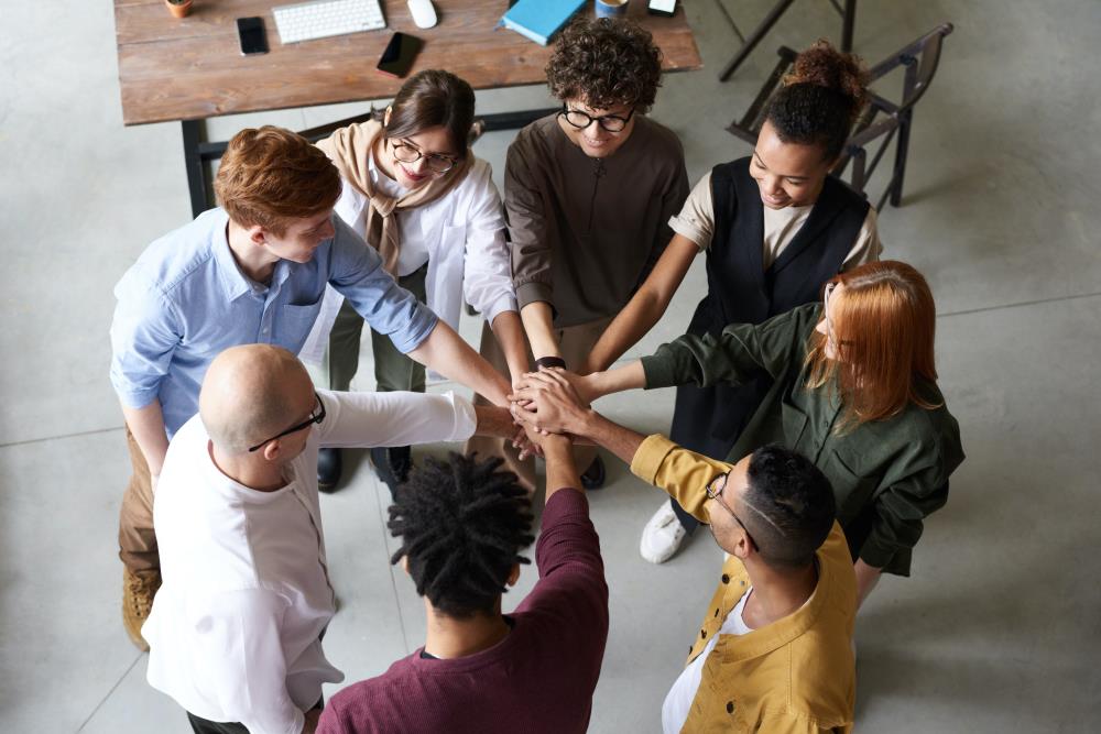 group of people sitting around a table